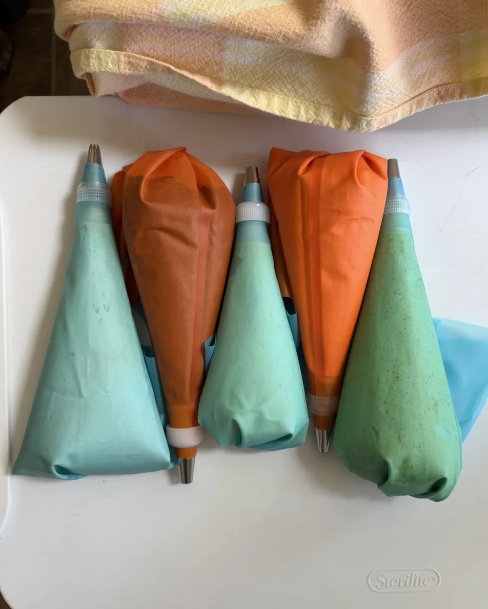 Aspen's piping bags, filled and ready for a batch of macarons