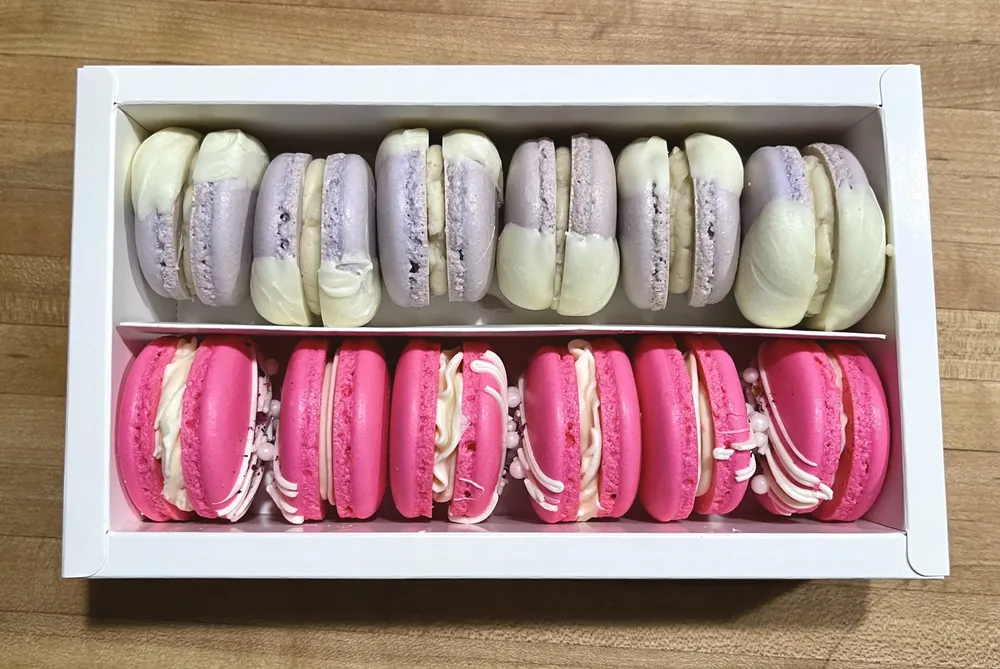 Lavender and raspberry macarons boxed for an order